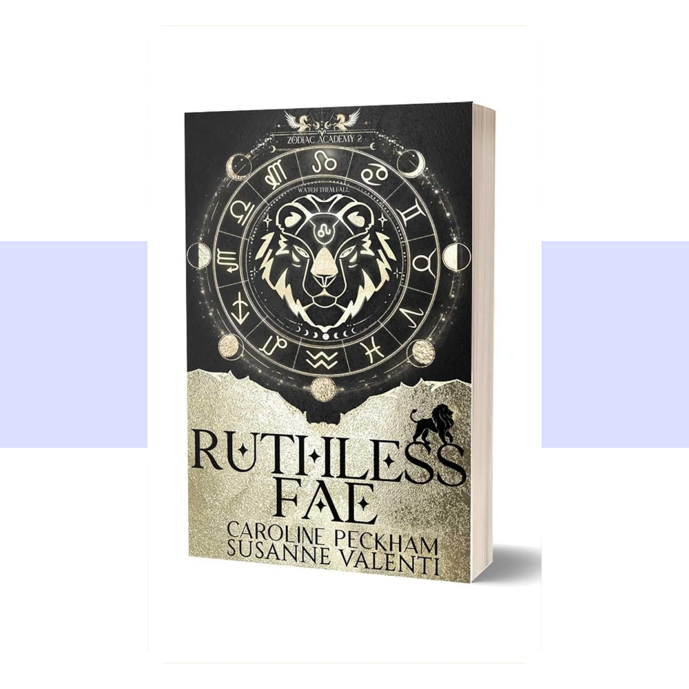 Book cover for Zodiac Academy 2: Ruthless Fae by Caroline Peckham and Susanne Valenti. The cover features a dark, dramatic fantasy design with a predominantly black and deep burgundy background accented by metallic gold details. The title “ZODIAC ACADEMY” appears across the upper portion in large gold serif lettering, with “RUTHLESS FAE” displayed prominently beneath it in bold gold capital letters. A detailed golden zodiac emblem and astrological symbols form a central decorative element.