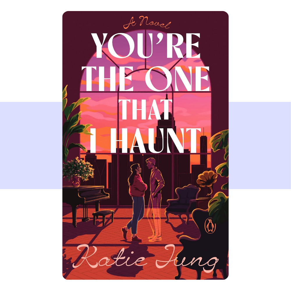 A playful paranormal romance cover for You’re the One That I Haunt by Katie Jung. The design presents the book as a contemporary romantic comedy with supernatural elements, combining a spooky/ghostly aesthetic with a lighthearted, romantic tone.