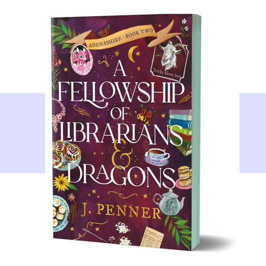 The book cover of A Fellowship of Librarians & Dragons by J. Penner features a whimsical, richly illustrated fantasy design in a soft palette of teal, turquoise, cream, and warm golden-brown. The cover is filled with cozy library and dragon-themed imagery, blending books, magical details, and charming decorative elements into a storybook-style composition. The title appears prominently in ornate, light-colored lettering, with the author’s name positioned near the bottom. 