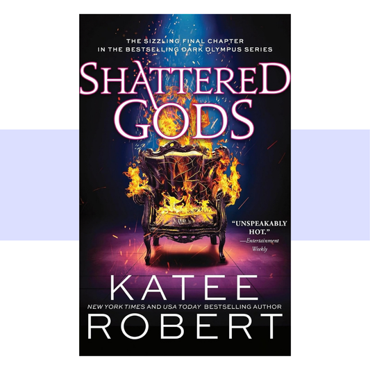 Book cover for Shattered Gods by Katee Robert, featuring a dramatic throne engulfed in flames, evoking the burning and destruction of Olympus. The design serves as a visual bookend to the throne featured on the cover of Neon Gods.