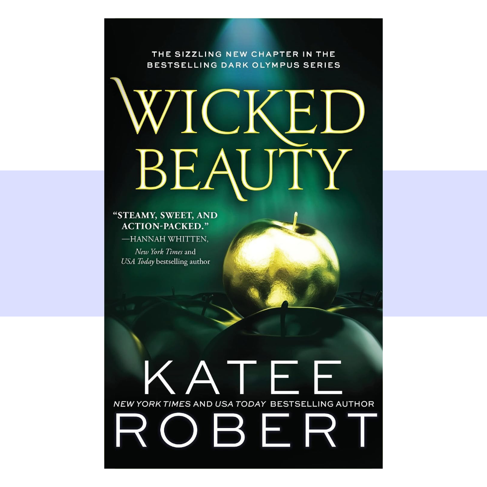 Book cover for Wicked Beauty by Katee Robert. The cover has a nearly black background with deep emerald green lighting and a glowing green halo behind the central image. Large gold-yellow serif lettering spells “WICKED BEAUTY” across the upper half of the cover. Beneath the title is a luminous metallic golden apple resting among dark green apples and tangled thorny vines, creating a dramatic, seductive interpretation of the forbidden apple motif. 