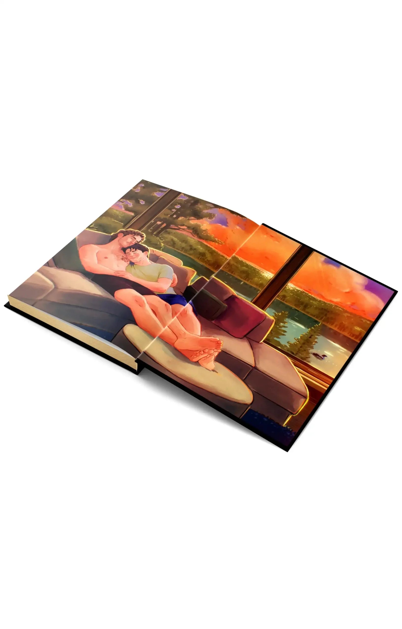 A hardcover art book shown open at an angle, displaying a colorful illustration of a couple on a chaise lounge by a lake at sunset.