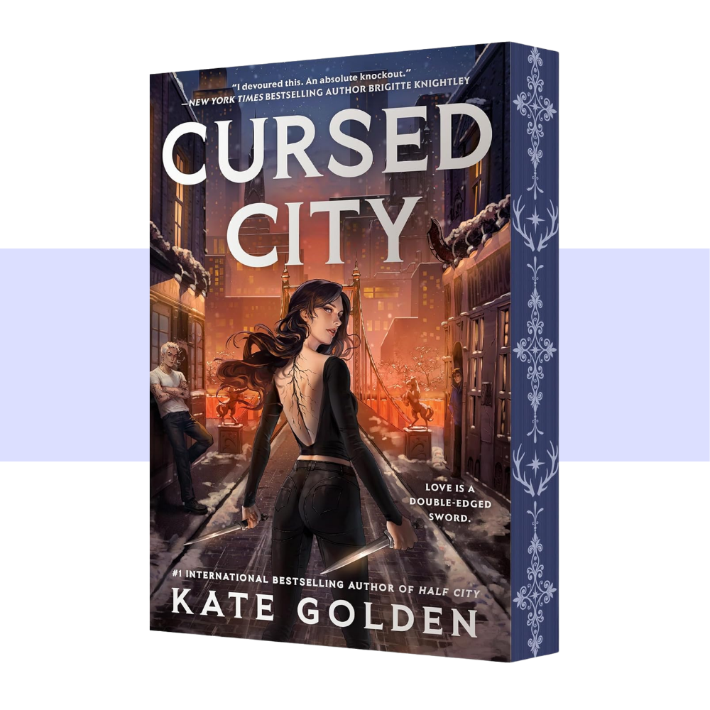 The book cover for 'Cursed City' by Kate Golden, shown as a 3D box mockup against a white background with a light purple horizontal stripe. The cover features a dark fantasy illustration of a woman holding a sword in a city street at night, with a dark blue spine decorated with white antler-like patterns.