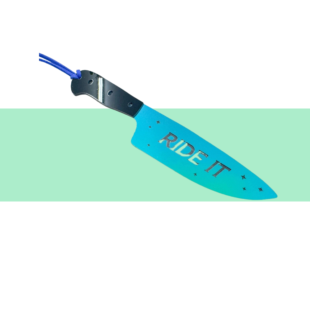 blue knife acrylic bookmark that says ride it 